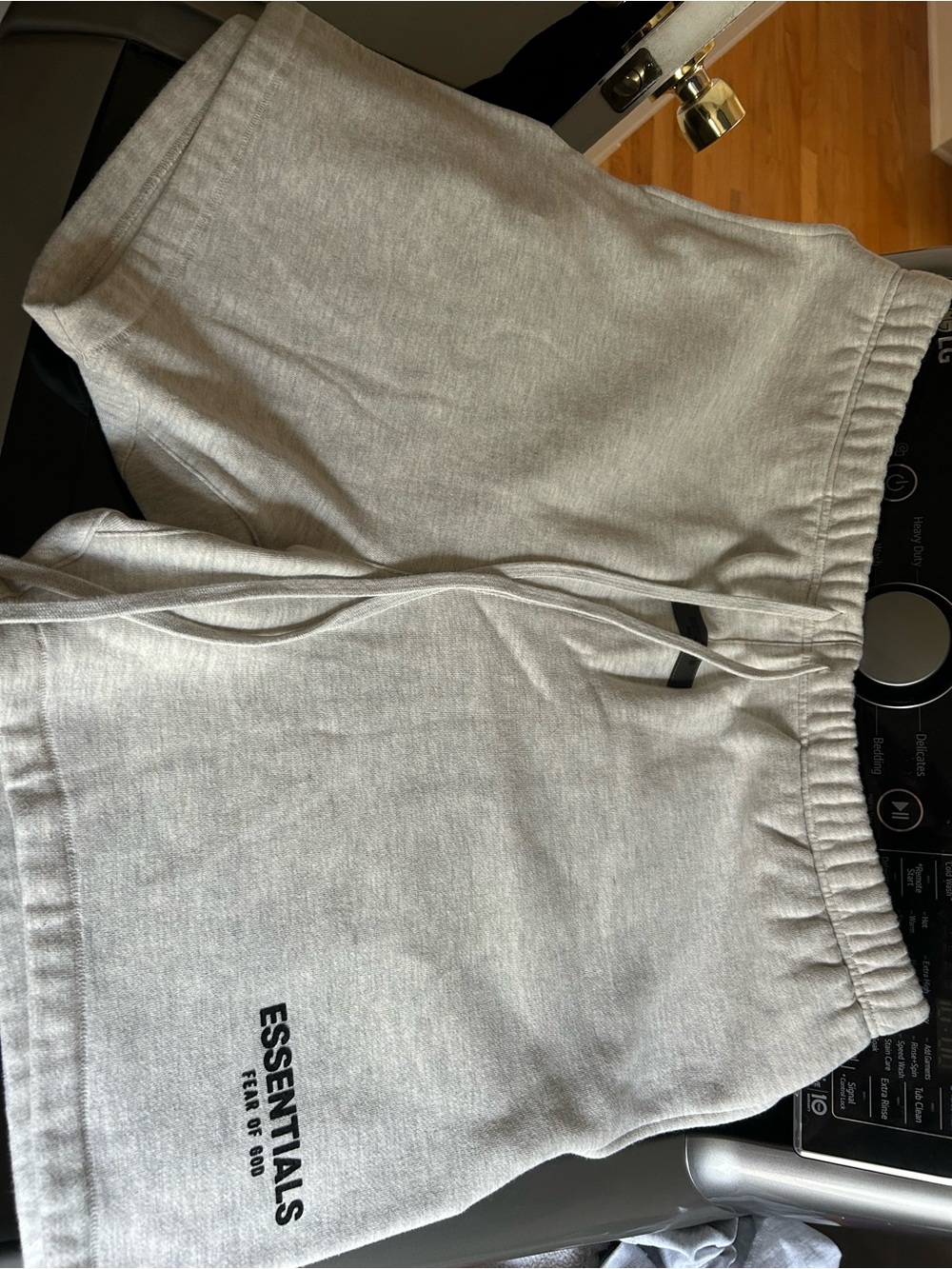 Essentials Men’s Heather Light Gray Logo Athletic Shorts